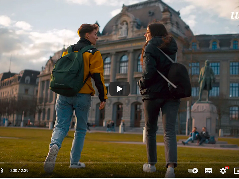 Image film, still with two students in front of the main building of the University of Bern